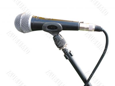 old metallic microphone isolated over white background