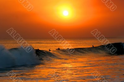 Surfers with Sunset
