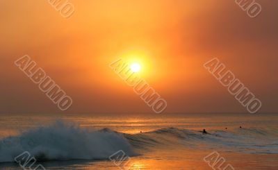 Surfers at Sunset