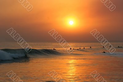 Surfers at Sunset