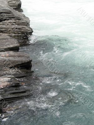 grey rock and river