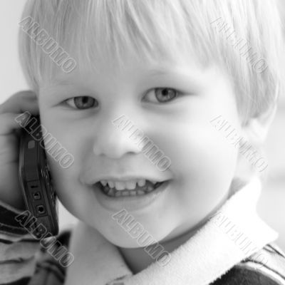 child speaks by phone