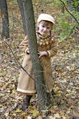 little girl in forest
