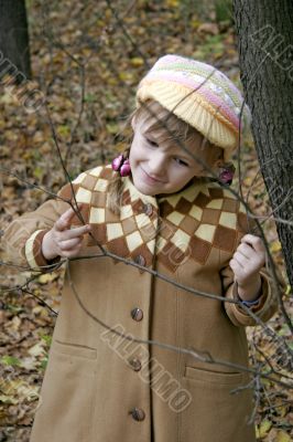 little girl in forest