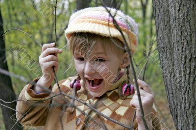 little girl in forest
