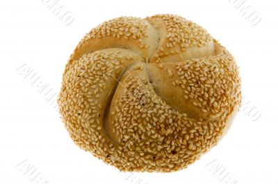 Roll with sesame against white background