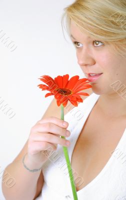 Blond Woman with a Bright Orange Flower