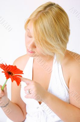 Blond Woman with a Bright Orange Flower
