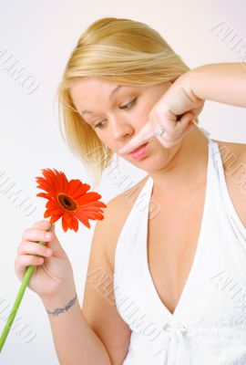 Blond Woman with a Bright Orange Flower
