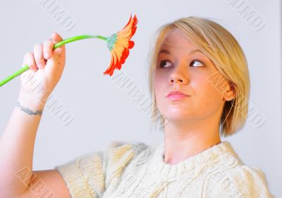 Blond Woman with a Bright Orange Flower