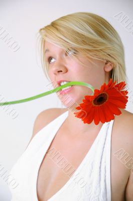 Blond woman with an Orange Flower