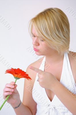 Blond woman with an Orange Flower