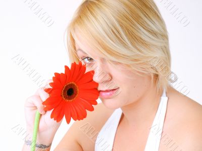 Blond woman with an Orange Flower