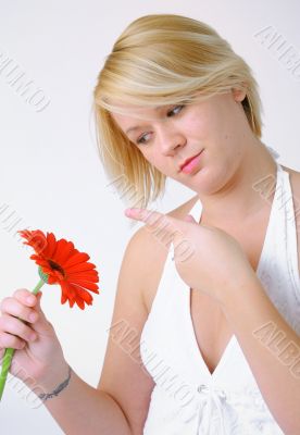 Blond woman with an Orange Flower