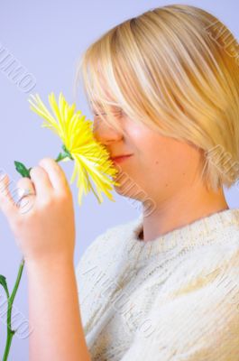 Blond woman with an Orange Flower