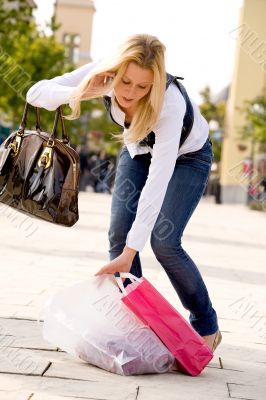 Bending blond woman