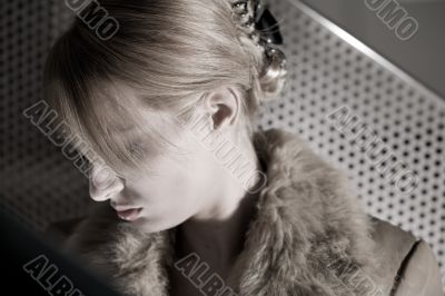 Portrait of a depressed blond girl