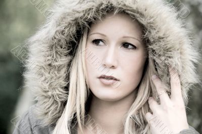 Blond girl with a cap