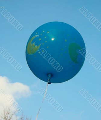Blue ballon in the sky.