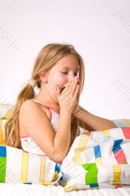 young girl yawning