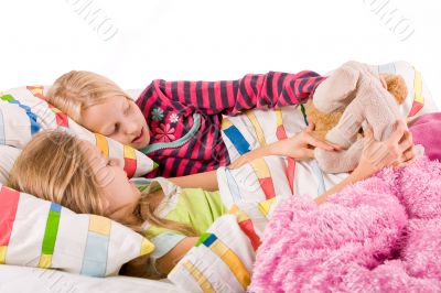 Playing with the bears in bed