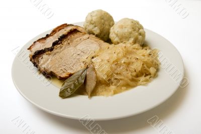 Roast port with pickled cabbage and dumpling
