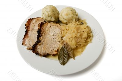 Roast port with pickled cabbage and dumpling