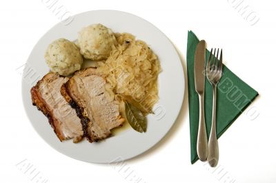 Roast port with pickled cabbage and dumpling