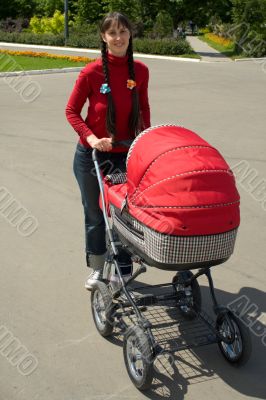 Woman with baby carriage