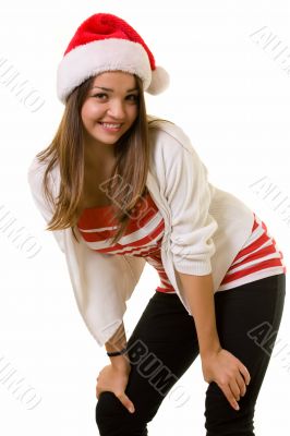 Smiling woman in Santa hat
