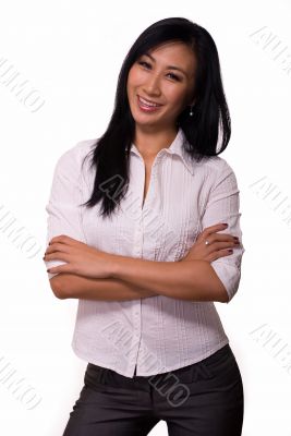 Smiling woman with crossed arms
