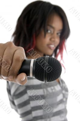 young girl showing microphone