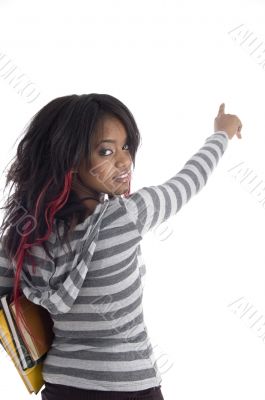 back pose of pointing schoolgirl