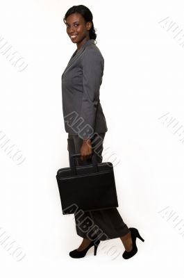 Business woman in grey pant suit