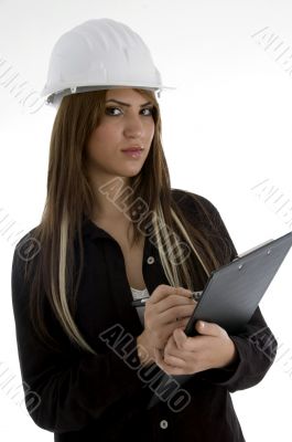 architect writing on notepad