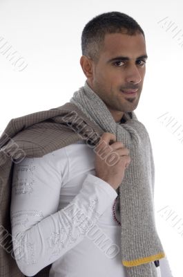 man holding his coat