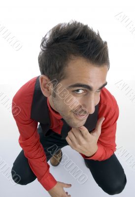 sitting man looking upward