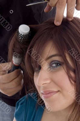 female taking haircut