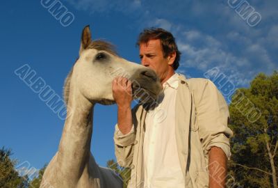man and little horse