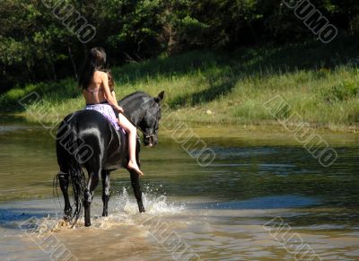 riding girl in a river