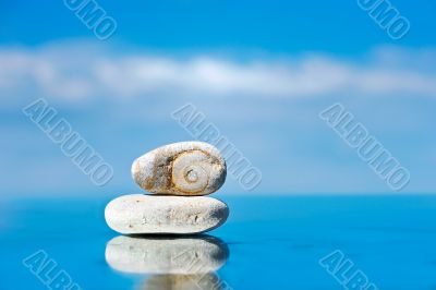 Stones reflected in water