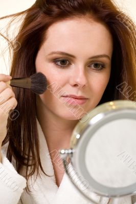 Putting on makeup