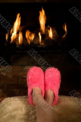Warming feet by the fire