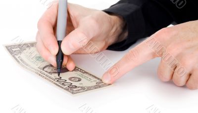 Male hand draw nil on dollar