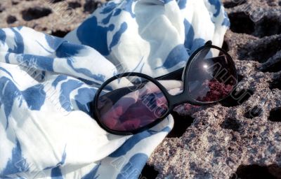 Sun glasses and pareo