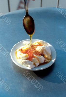 Plate with yoghurt and honey
