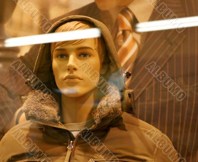 Man mannequin in vetrine of store