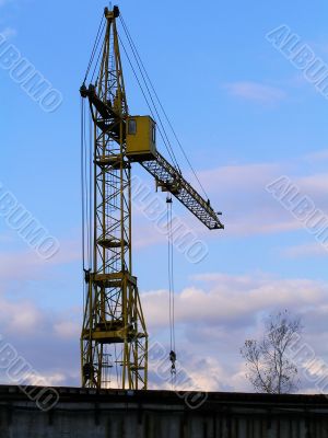 Yellow crane and clouds