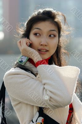 Young woman with mobile phone