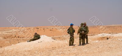 Israeli soldiers excersice in a desert